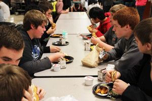 A group of Seahawks enjoying their lunches. 