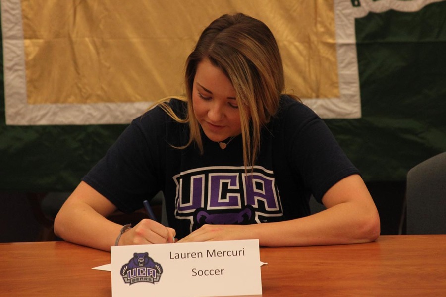 Soccer player Lauren Mercuri signing letter of intent to University of Central Arkansas. 