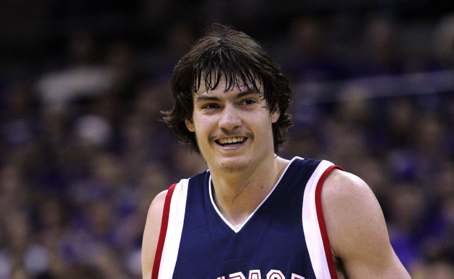 ** ADVANCE FOR WEEKEND EDITIONS DEC. 10-11 ** Gonzagas Adam Morrison smiles briefly during a game against Washington, Sunday, Dec. 4, 2005, in Seattle. The first time Morrison touched the ball in a college basketball game, he dribbled the length of the floor and scored on Saint Josephs in Madison Square Garden. The preseason All-America has been a big-time player ever since for No. 9 Gonzaga. He currently leads the nation with an average of 29.7 points per game. (AP Photo/Elaine Thompson)