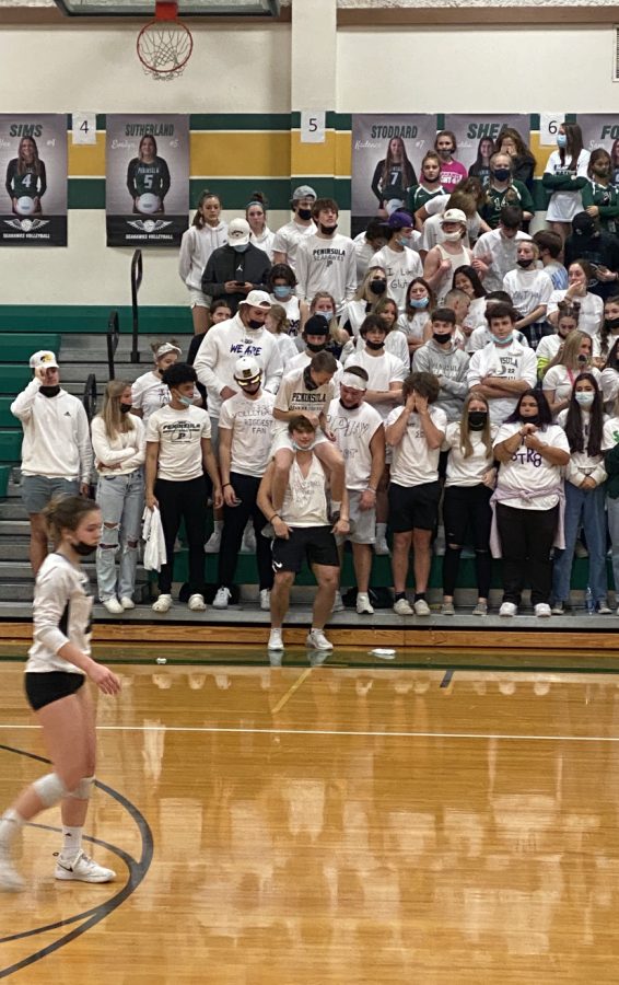 A white Out theme at one of the 2021 volleyball games